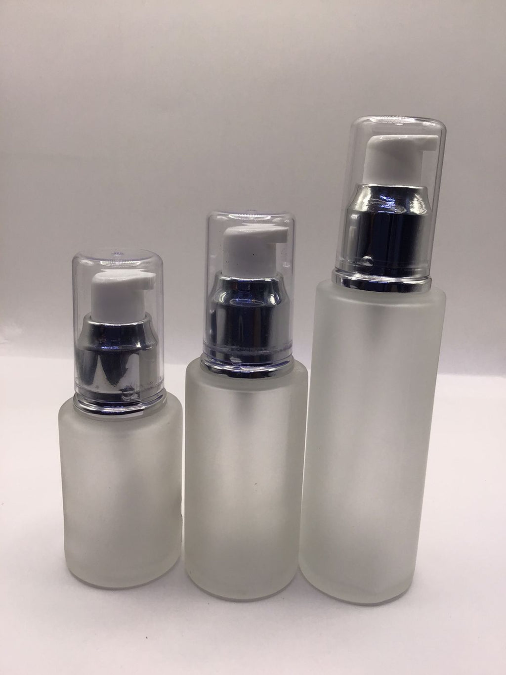 Frosted Glass Lotion Pump Bottle with Silver Dispenser