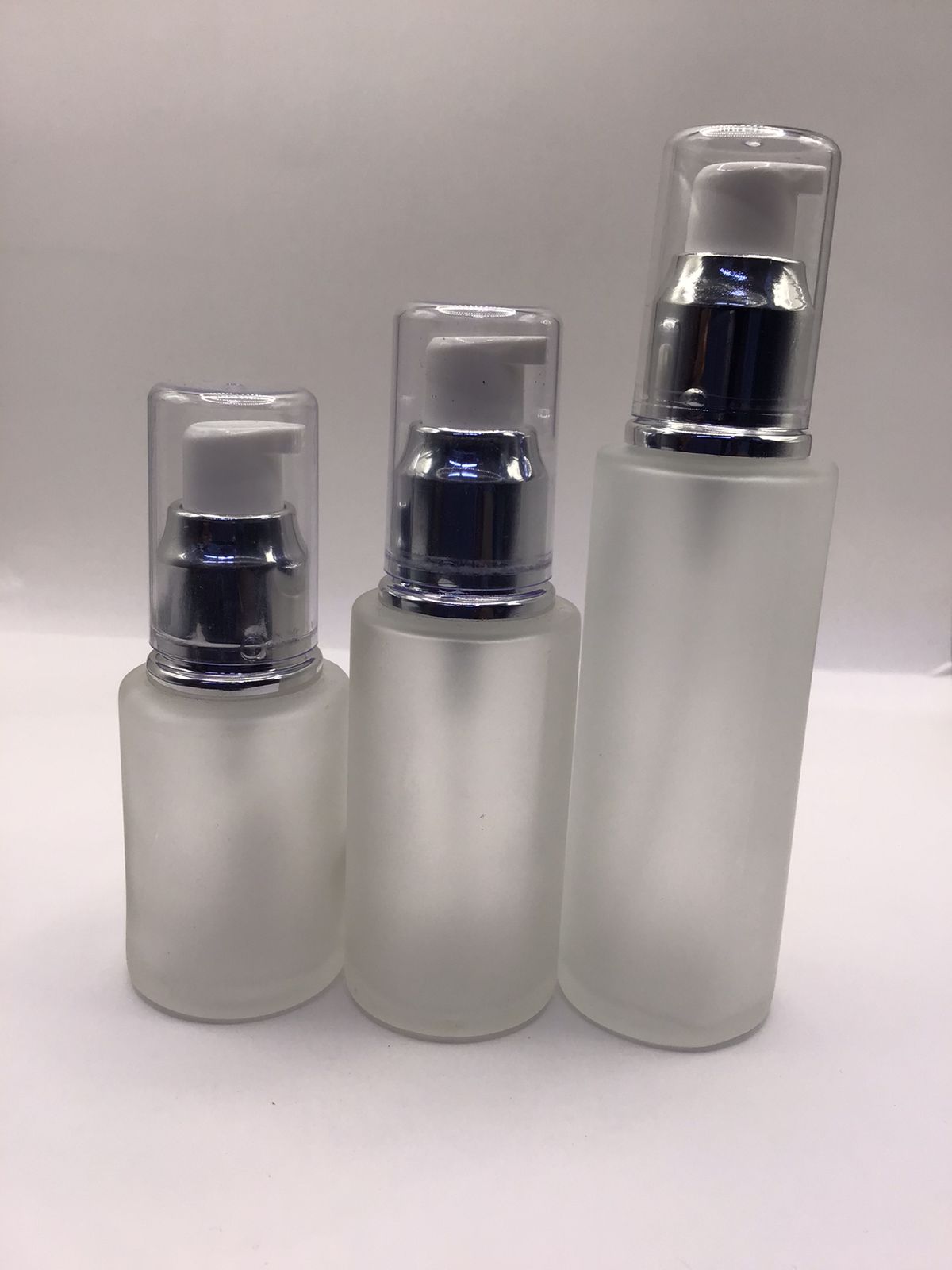 Frosted Glass Lotion Pump Bottle with Silver Dispenser