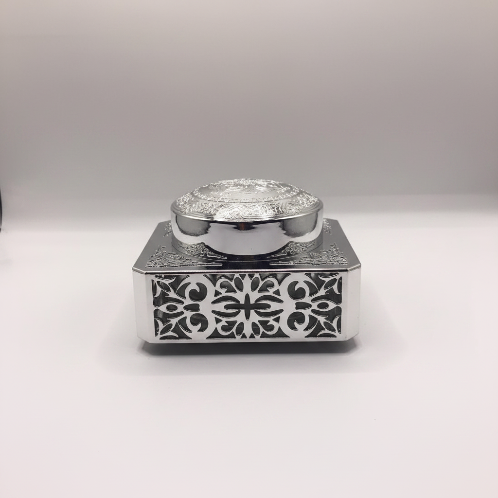 Ornate filigree square Bakhoor jar – silver, front studio shot