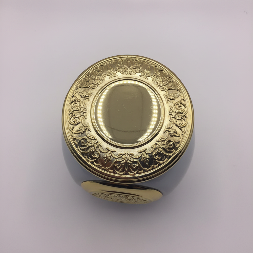 Grey ceramic Bakhoor jar – overhead top-down view of gold arabesque lid