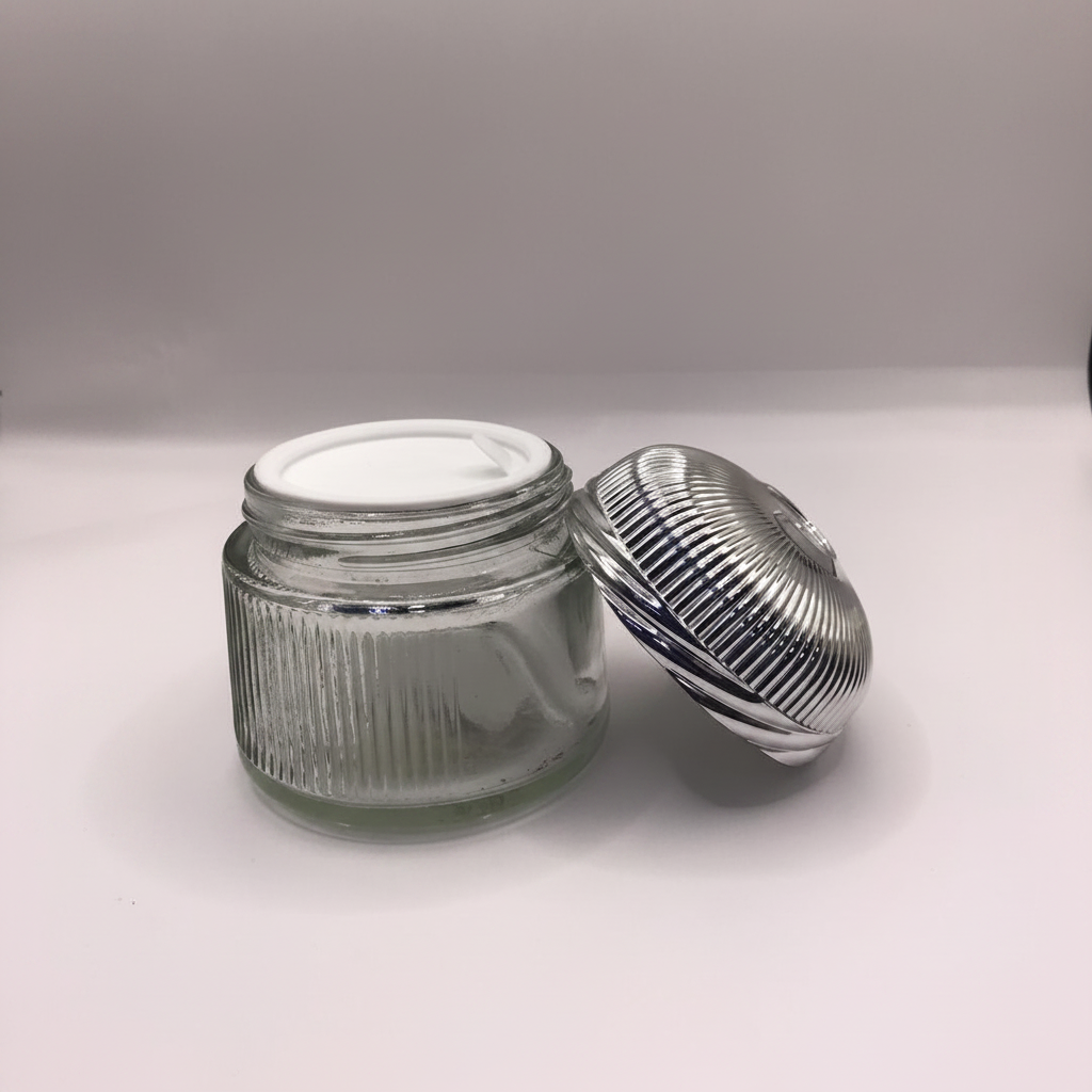Ribbed glass Bakhoor jar open with chrome dome lid beside it