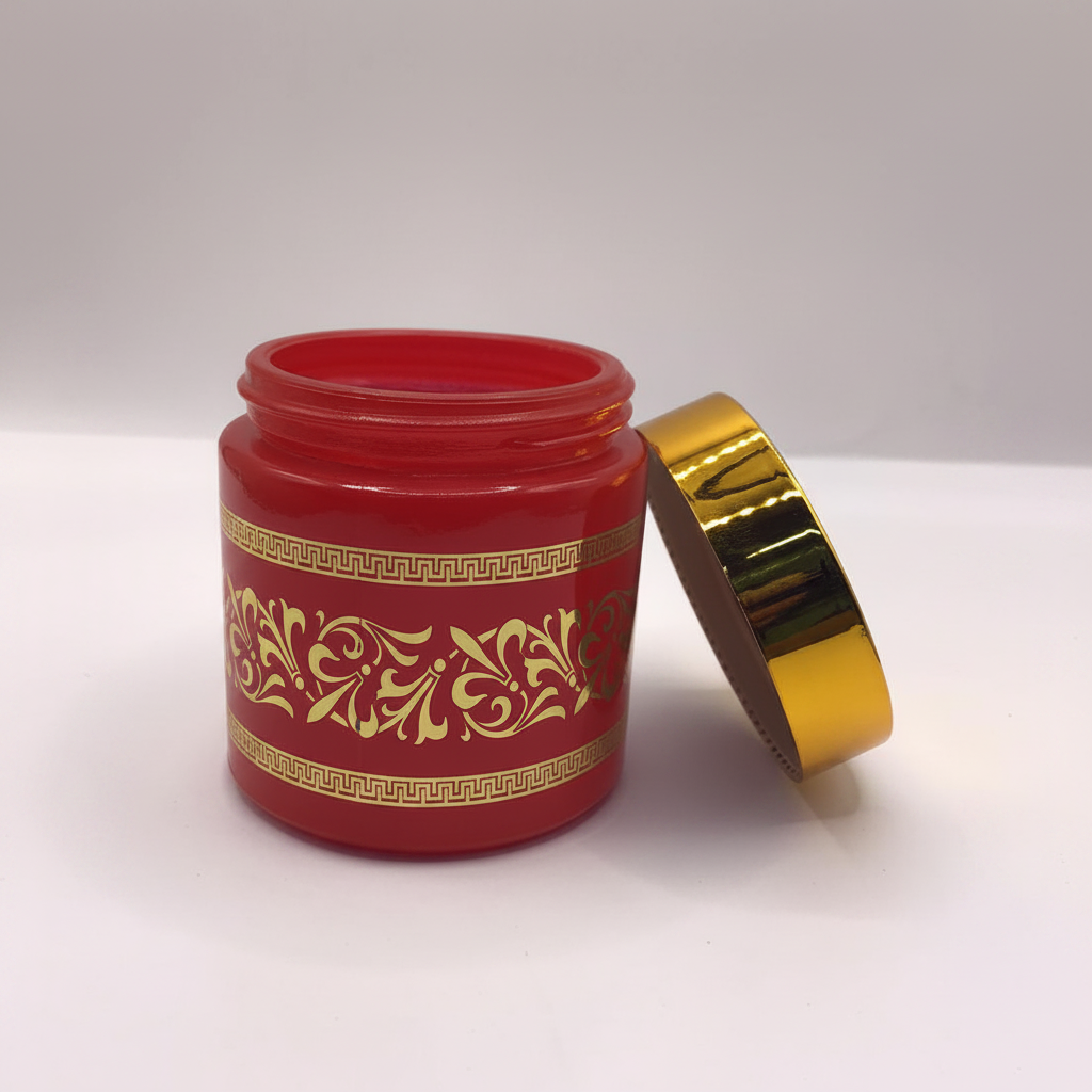 Crimson red gold arabesque bakhoor jar studio white background