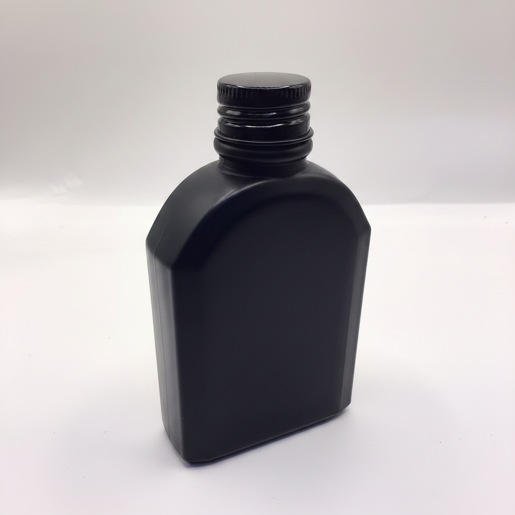 Matte black glass bottle studio white background