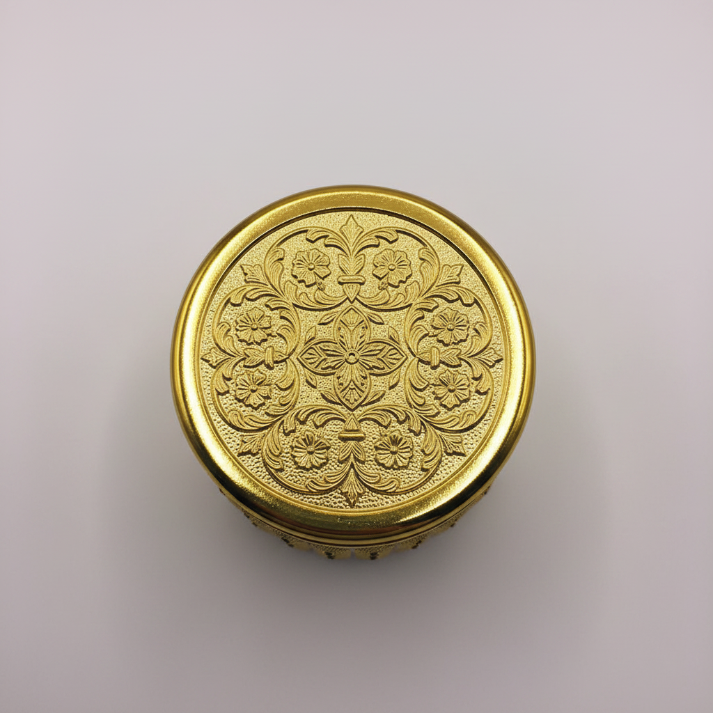 Royal gold arabesque Bakhoor jar – overhead top-down view of ornate lid