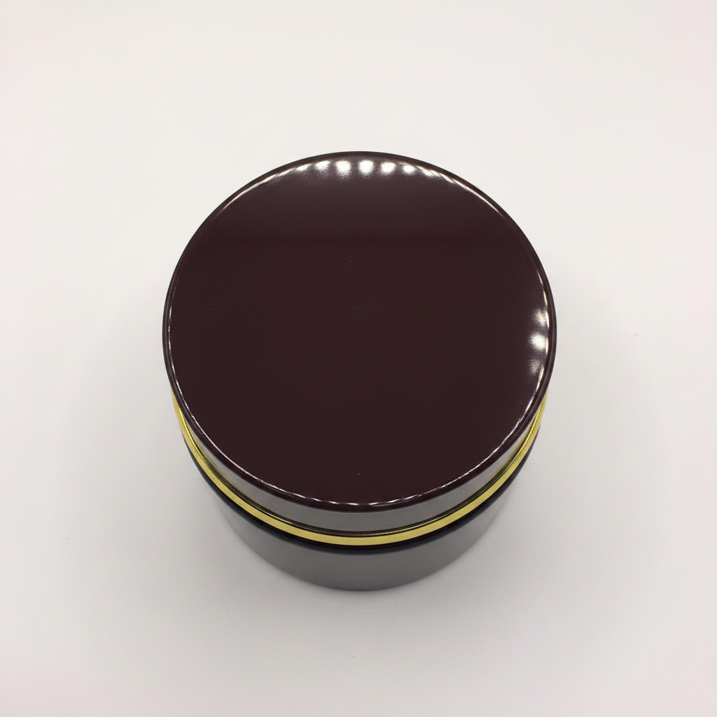 Glossy brown Bakhoor jar – overhead top-down view