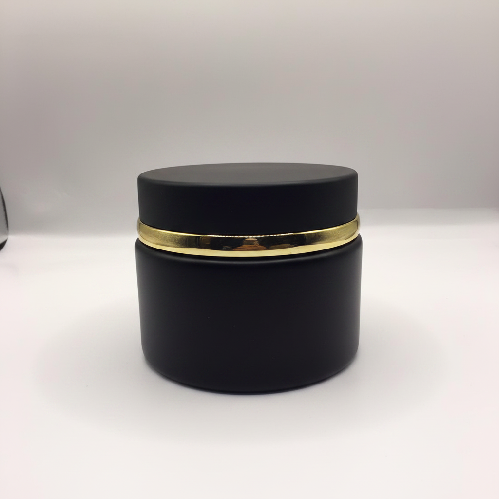 Matte black Bakhoor jar with gold band – front studio shot